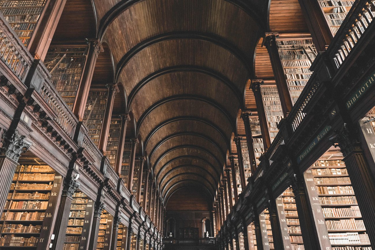 Long Room in library at Trinity College Dublin, Ireland on Flight + Hotel All Inclusive Vacation Package