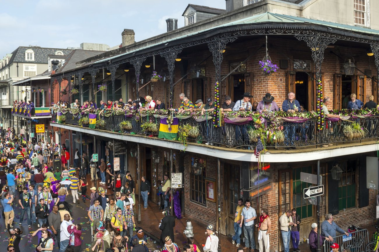Aerial view of people watching parade at Mardi Gras in New Orleans on a Louisiana Flight + Hotel vacation package