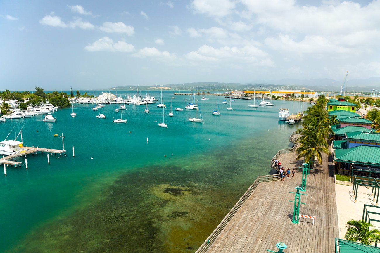 Aerial view of La Guancha boardwalk and bay with boats in Ponce, PR on a Flight + Hotel vacation package