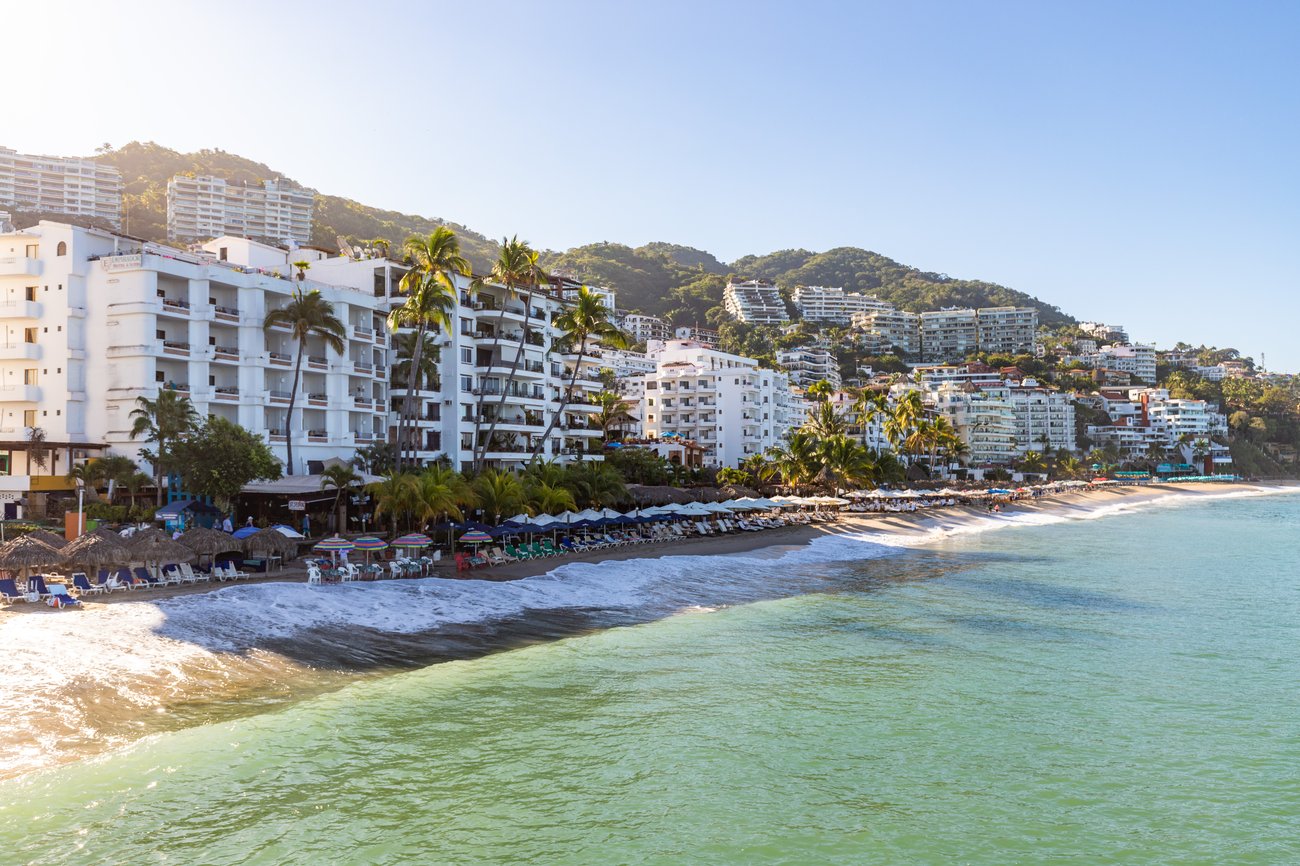 Aerial view of Puerto Vallarta and beach from the water on a Mexico Flight + Hotel JetBlue Vacations package