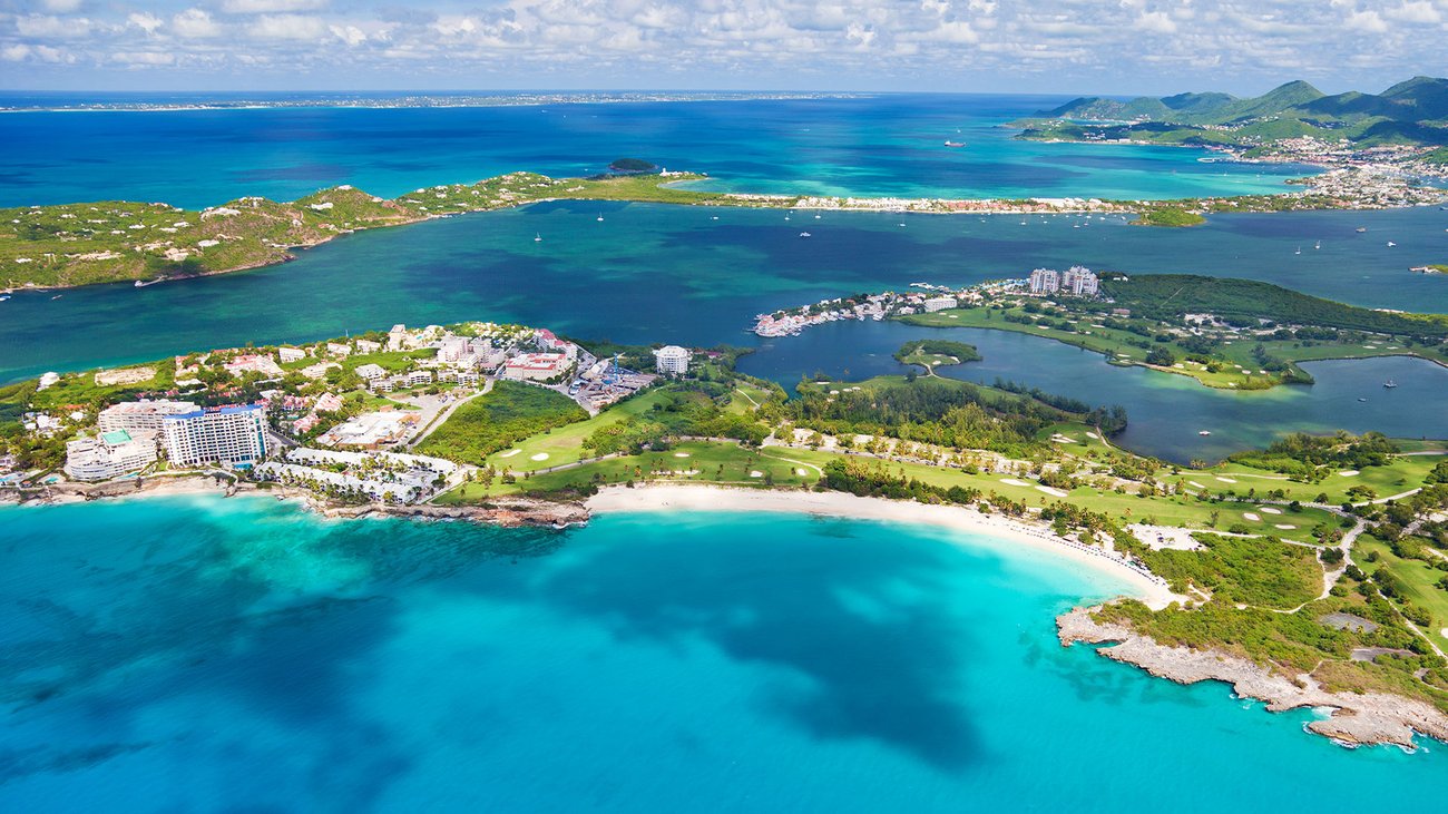 Aerial view of St. Maarten and surrounding waters on a JetBlue Vacations Flight + Hotel all inclusive package