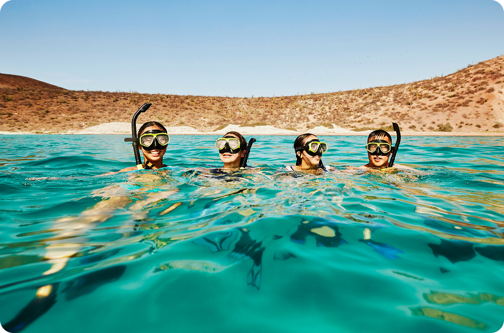 Teens snorkeling