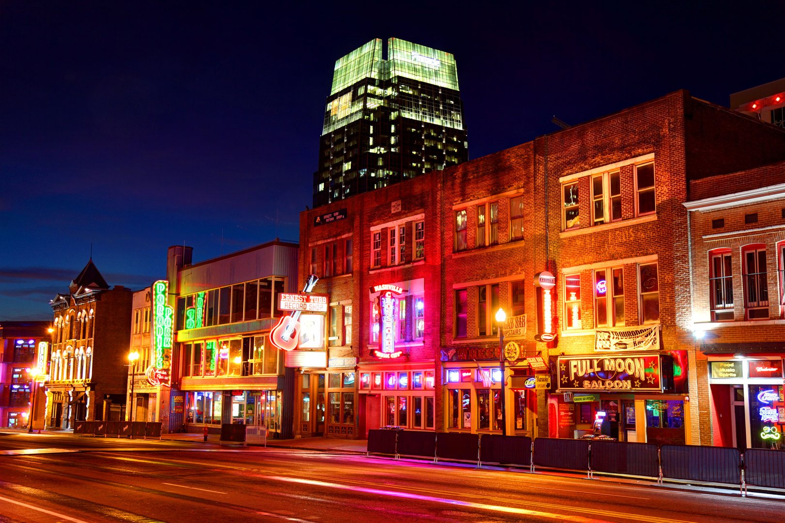 View of neon lights on Broadway at night during a Nashville, TN Flight + Hotel JetBlue Vacations package