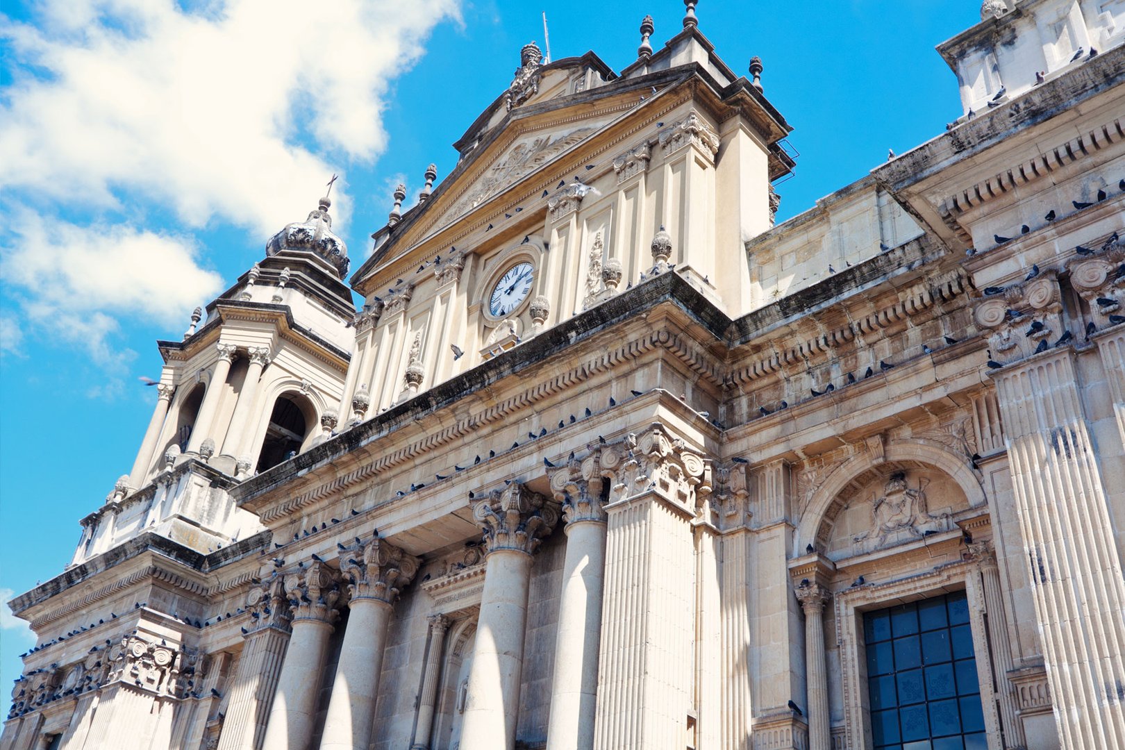 Upward view of Guatemala National Palace on a Guatemala Flight + Hotel all inclusive vacation package