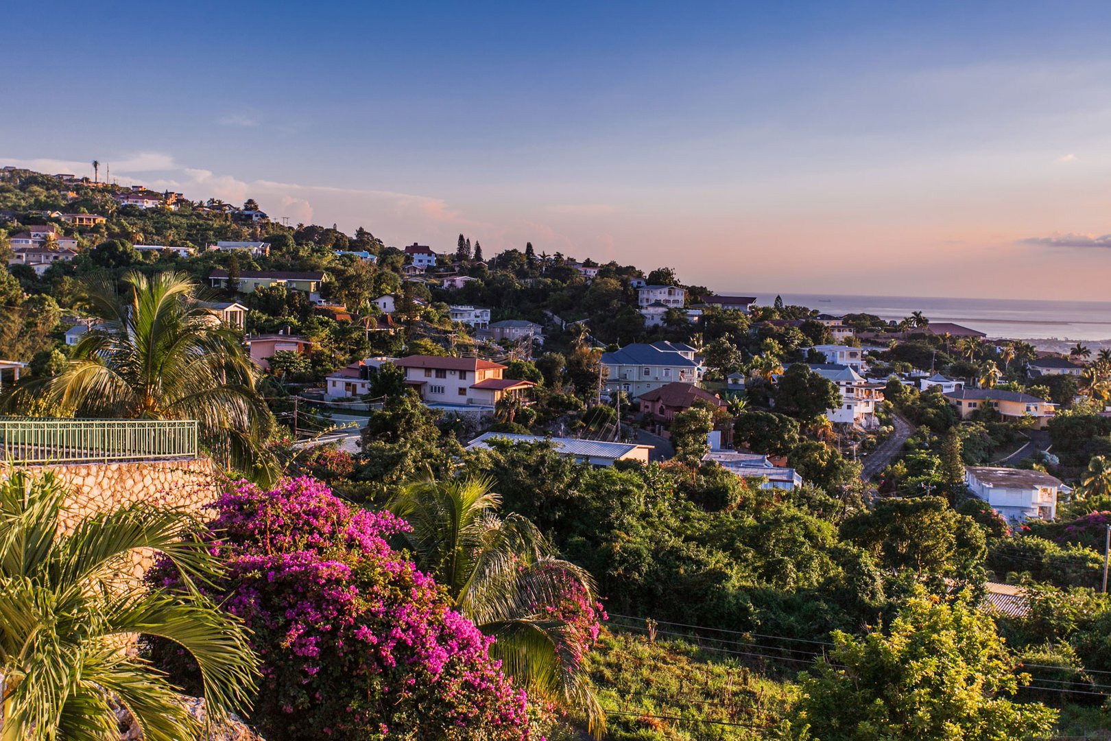 Sunset aerial view of hillside in Kingston on a JetBlue Vacations all inclusive Caribbean package to Jamaica