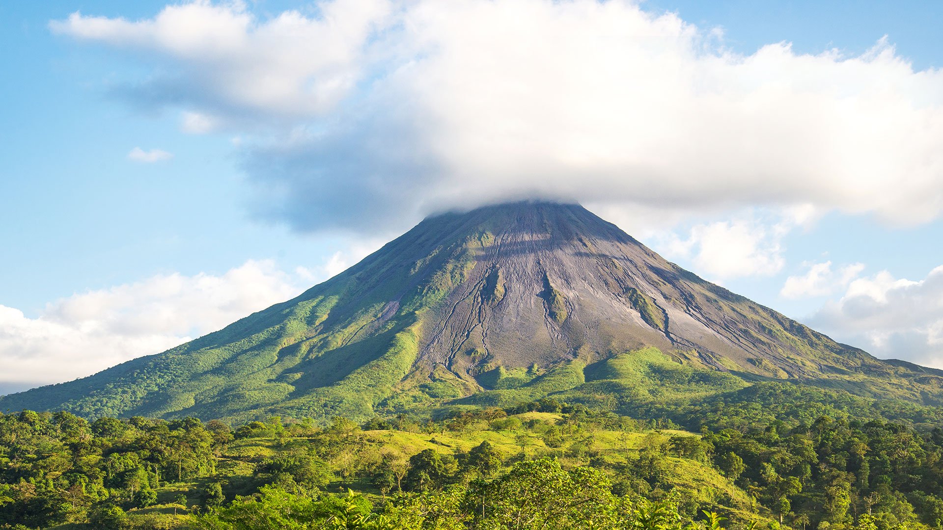 View of foliage and mountain in Liberia on a JetBlue Vacations Flight + Hotel all inclusive package