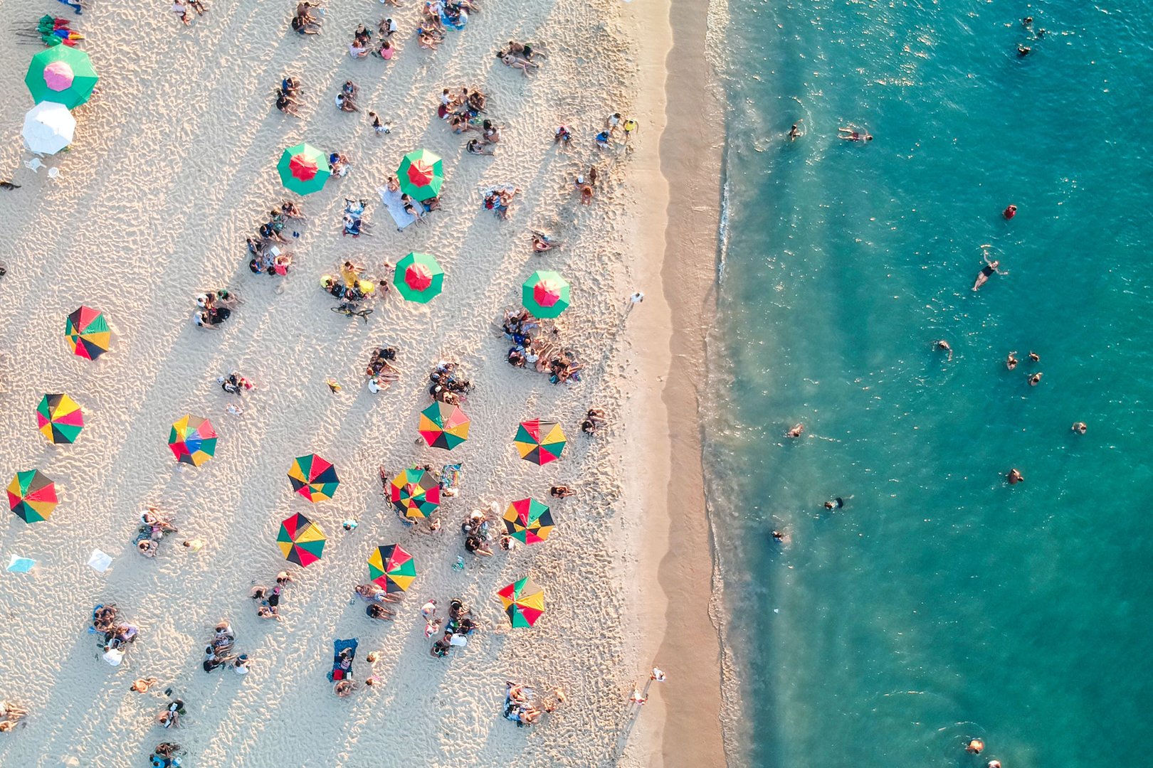 Aerial view of umbrellas on Miami Beach on a Flight + Hotel Florida vacation package