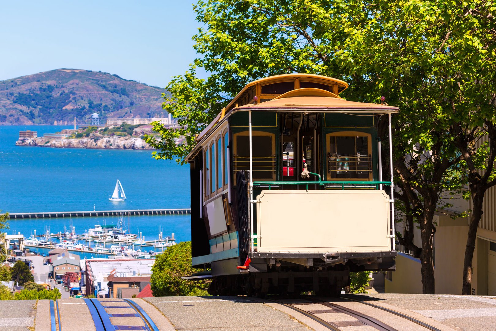 View of cablecar and harbor with mountains in San Francisco Flight + Hotel JetBlue Vacations package