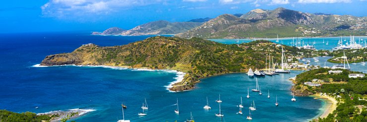 Aerial port and landscape view of Barbuda on a JetBlue Vacations package to the Caribbean