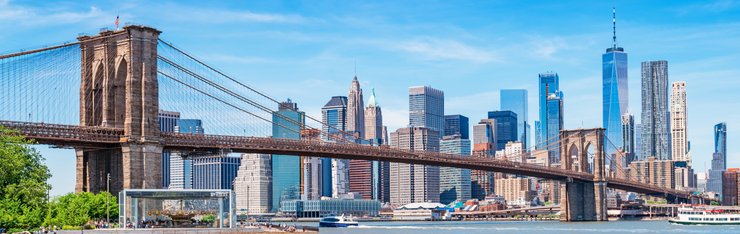 View of bridge and skyline of New York on a JetBlue Vacations all inclusive package to New York