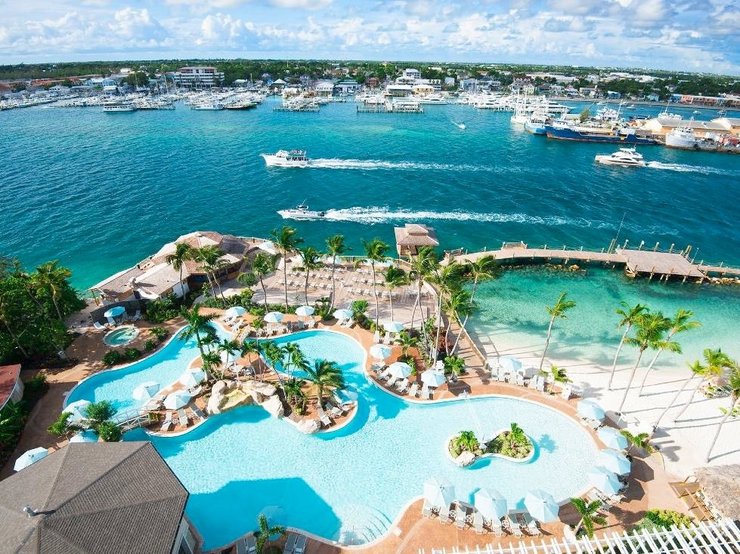 Aerial beach and pool view of Warwick Paradise Island Bahamas, All Inclusive, Adults Only on a Flight + Hotel package